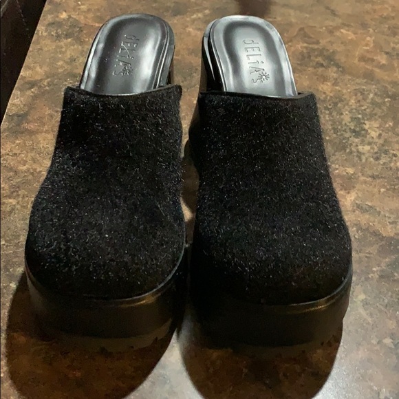 black platform clogs